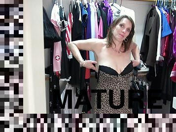 Naughty mature brunette Mimi S. masturbates in a dressing room
