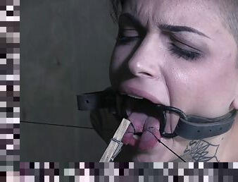Tattooed short haired punk slut Leigh Raven tied to a pole