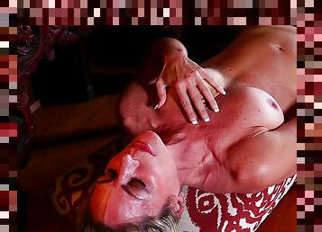 Blonde mature amateur MILF Sydney strips and oils up her body