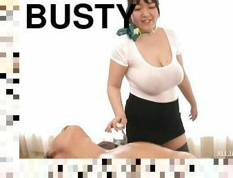 Busty Japanese Mochida Yukari gives an oily handjob and a titjob