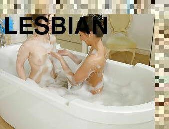 Angela Allison and Lilit Sweet in a lesbian bath sex scene