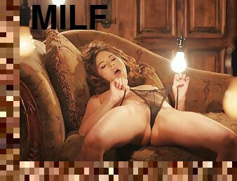 Solo brunette MILF model Shyla Jennings masturbates in silky underwear