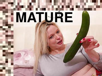 Crazy hot blonde mature enjoying solo masturbation with cucumber