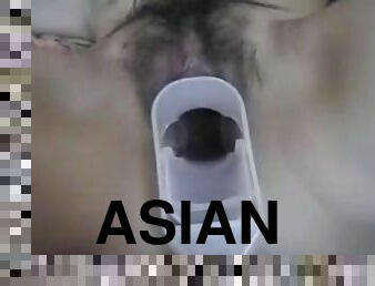 Freaky Asian chick and her guy have a piss party