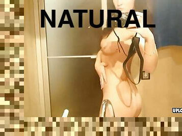 Perfect looking chick showing her naked body