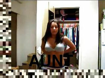 Brunette teen girl flaunts her goodies on webcam