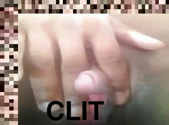 Girl rubs her gigantic clit