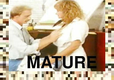 Mature milf gets a good fuck in the office with a boss
