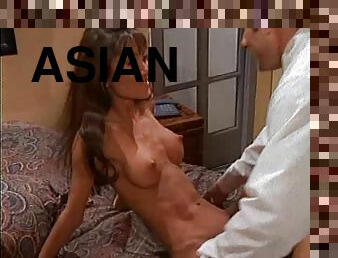 Fake-titted Asian slut is naked and ready to have her cunt wasted