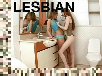 Hot teen lesbian action takes place n the bathroom