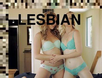 Two blonde lesbians in love having a very fun time