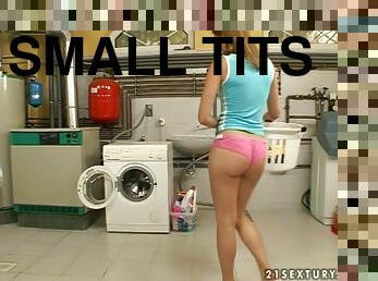 Horny chick Jo enjoys playing with her snatch in the laundry