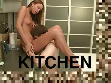 Kitchen sex with a horny teen couple