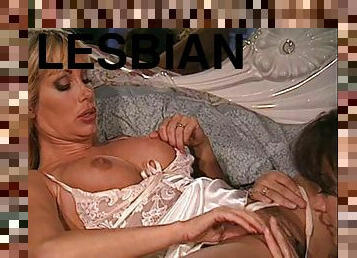Big tits Asia Carrera licking her lesbian babe pussy