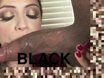 Ariella Ferrera has her mouth full of a man's black dick