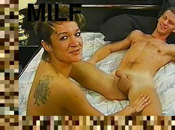 Milf sucks his cock skillfully in a lusty vintage porn