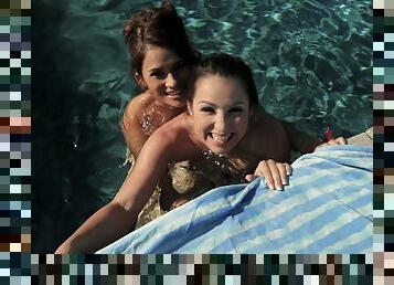 A home video captures wet, wild lesbian fun in the pool