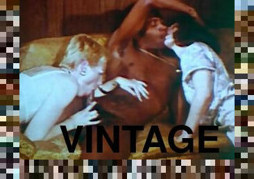 Vintage interracial threesome with black dude and 2 white women - classic porn
