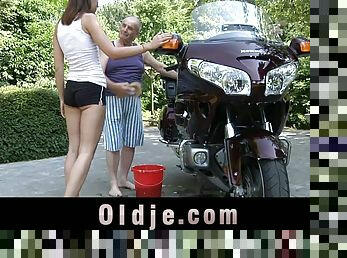 A much older guy gets to bang a teen slut by his motorcycle