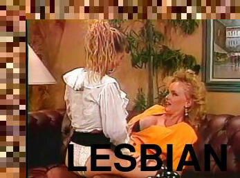 Two fair-haired lesbians share a double dildo in retro sex video