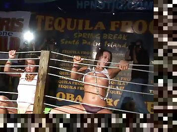 Drunk girls get topless during a wet t-shirt contest