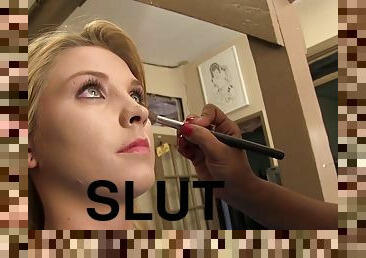 Sexy blonde slut backstage getting her makeup done