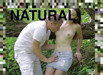 Sexy teen with natural tits getting slammed outdoors in erotic forest sex clip