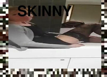 Skinny mature woman in the toilet