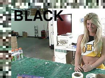 Kristie Creame is a cheerleader who wants to feel a black cock