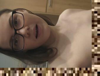 Nerdy girl rubs her nipples and her pussy