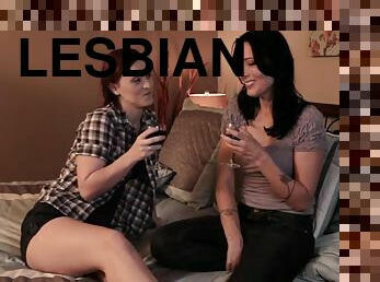 Sexy brunette lesbians have sensual fuck in bed