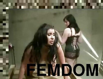 Femdom dominate teaches a lesbian some lessons with a whip and dildo