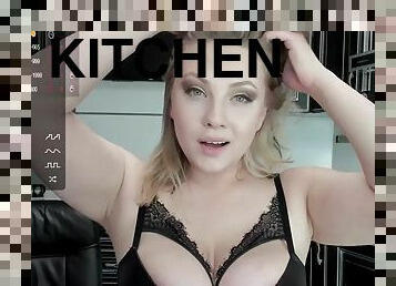 Sexy blonde masturbates in the kitchen