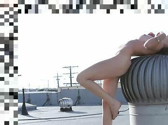 Irresistible Amber Sym feels freedom naked on the roof