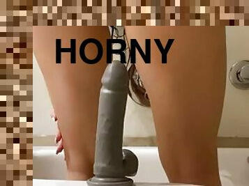 Horny teen cums riding a big dildo