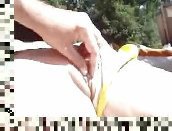 Horny Chick's Fingered While Tanning