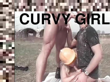 Curvy girl sucks two dicks and they suck each other