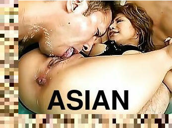 Asian Cutie Squirts All Over the Place In A Threesome