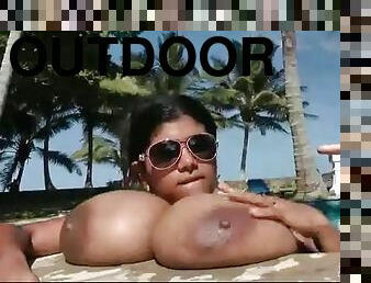 Voluptuous solo girl with huge tits outdoors