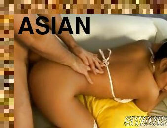 Pigtailed Asian teen does doggystyle anal