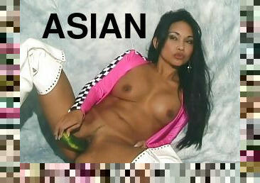 Asian puts on her white leather boots and shows off her titties