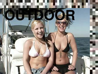 Bikini babes at sea flash their perky tits on the boat