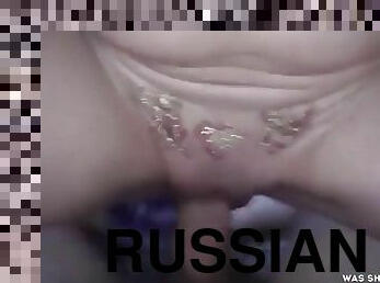 Russian MILF rides a cock and squirts