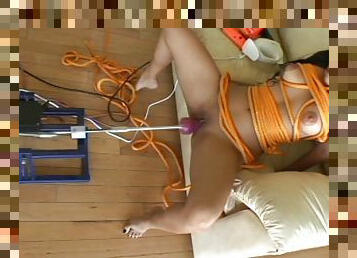 Kinky hardcore woman enjoys a rough ass and pussy fucking by a machine