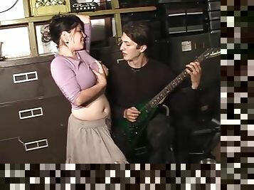 Brunette girl with huge boobs gets fucked by a guitarist