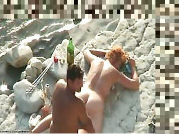 Voyeur Redhead Mature Gets Massaged and Fucked On The Beach