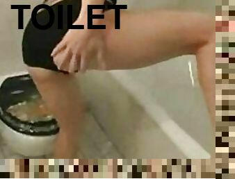 Stunning Babe Masturbating with a Toilet Brush