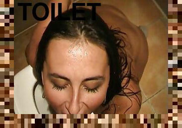 Randy chick getting pissed on in the toilet after giving blowjob