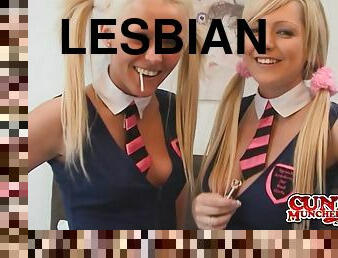 Two kinky blond lesbians share a double dildo indoors