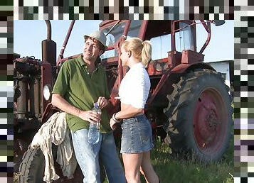 Blonde gets her pussy fucked by the tractor with big cock